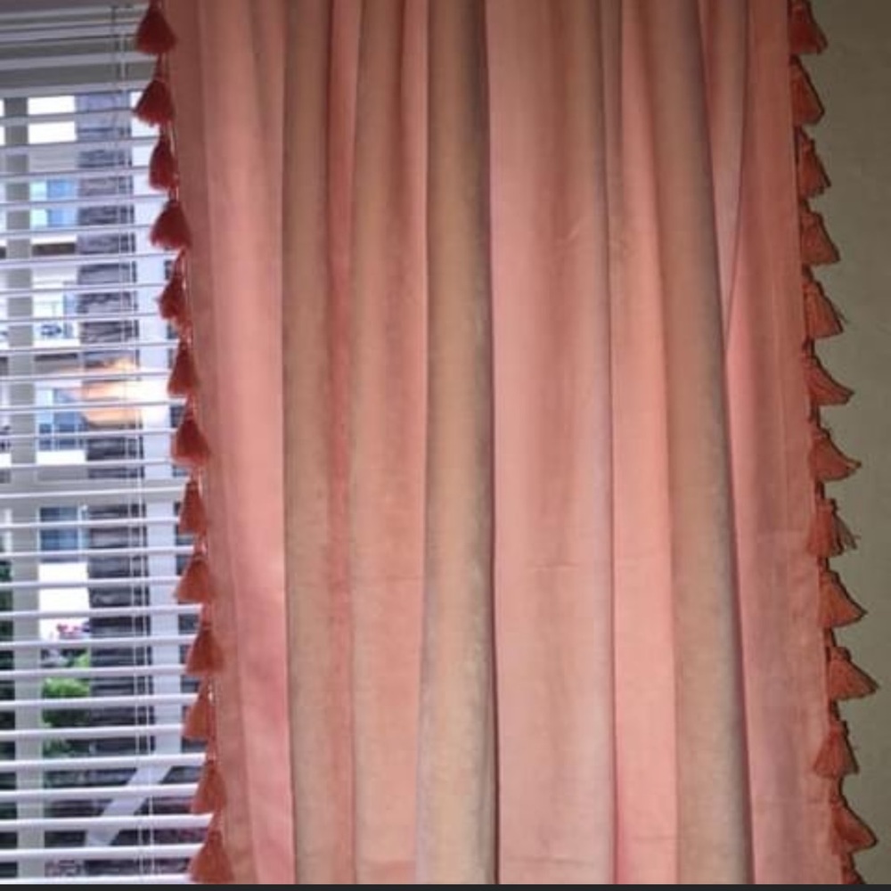 curtains (2 panels).  peach/pink in color. used one semester in college